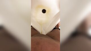 Amateur lady pissing in the toilet