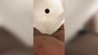 Amateur lady pissing in the toilet