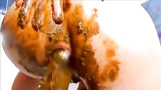 Milf smearing shit on her body while masturbating