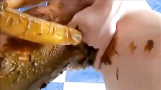Milf smearing shit on her body while masturbating