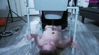 Slim sexy brunette babe smearing shit on her lovely body