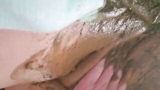 Playing with her green sticky shit