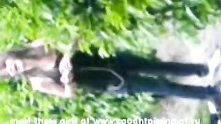 Amateur brunette babe caught pissing in the garden