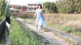 Pretty girl peeing in streams Outdoor