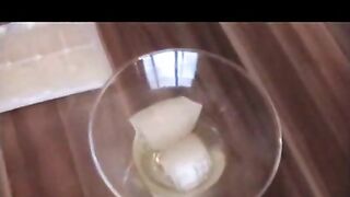 Brunette slut makes herself a pee cocktail