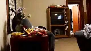 Woman plays with shit on the table while a man watches
