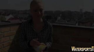 Threeway golden shower on the rooftop