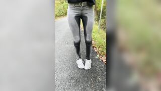 Tight grey jeans get drenched in pee
