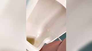 Using the urinal for pissing