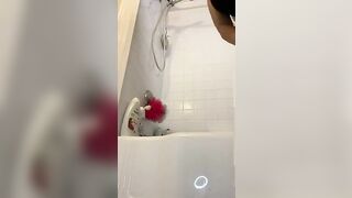 Stunning hot chick dropping in the bathtub