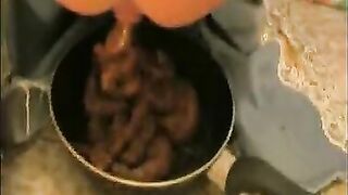 Yummy lady shitting in the black bowl