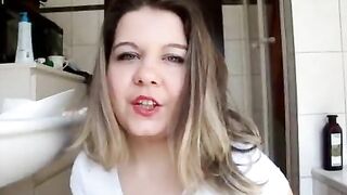 Girl with red nails pissing while playing with poop