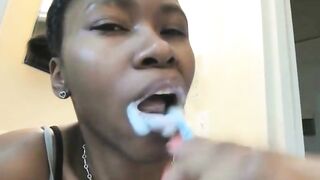 Cute black chick drops a big shit load standing