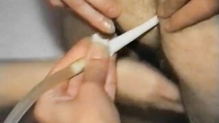 Three girls sitting on a bed, shitting, pissing and fingering each other's assholes