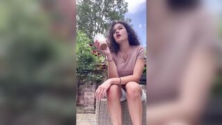 Cheeky brunette showing her hot ass and shit outdoor