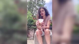 Cheeky brunette showing her hot ass and shit outdoor