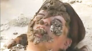 Girl in water plays in her own piss