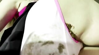 Blonde in panties and a mask squats down to take a shit