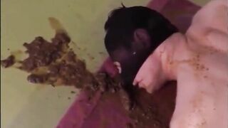 Brunette shits on a slave
