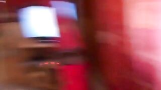 Girl pees in a plastic bowl between her legs