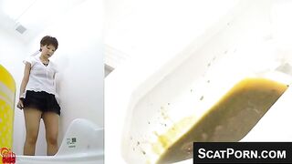 Girl squats over toilet and takes a huge shit