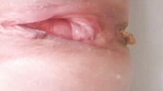 Woman shits in an adult diaper