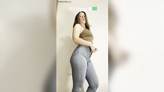 Two girls get close and personal with each other's asses