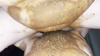 Woman spreads her ass cheeks while covered in shit