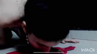 Girl with mouth full of shit looks up at camera