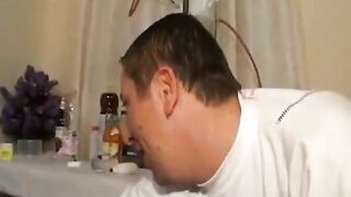Woman is having her ass filled with an enema