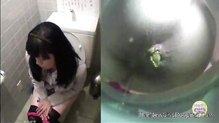 Woman takes a shit in a public toilet