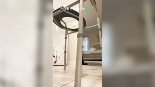 Woman takes a huge shit on the floor while bent over under a bed