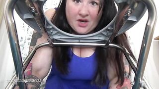 Girl sticks her face into a chair to eat shit