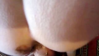 Woman licks brownish shit from another woman's ass