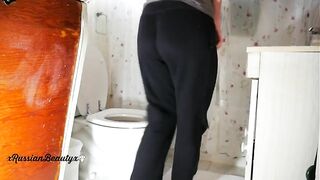 Girl takes a huge shit on the toilet and plays with it