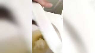 Girl takes a shit on the floor with her ass out and gets it on her feet
