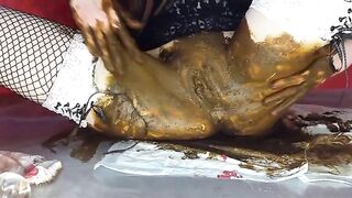 Girl poops a huge load out of her asshole