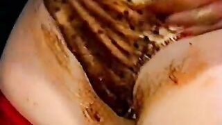 Woman and man eat shit off each other's face in the shower