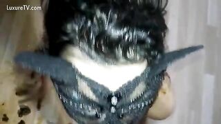 Girl eats her own shit while wearing a cat mask