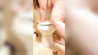Girl spreads ass and shits on a toilet