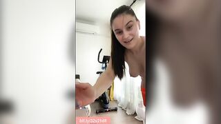 Woman in orange stockings poops on a purple towel