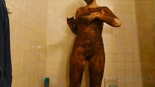 Woman licks and rubs shit all over her body in the shower