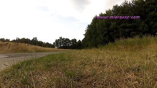 Girl bends over and shits in the grass