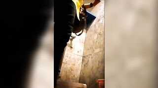 Girl squats in the toilet and plays with her ass