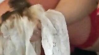 Two girls use a spoon to eat shit from a pan