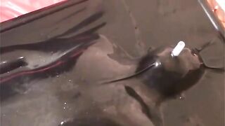 Women lick and play with shit in the ass and on a plastic sheet