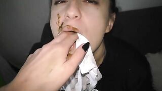 Two women put shit in a cloth and eat it