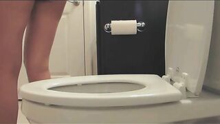 Girl takes a big shit in the bathroom