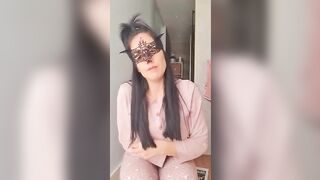 Woman takes a shit on a newspaper in the bathroom