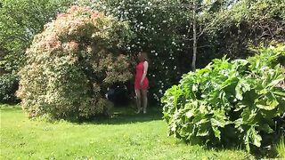 Chick squats and takes a massive shit in the grass